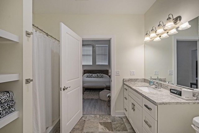 bathroom with vanity and walk in shower