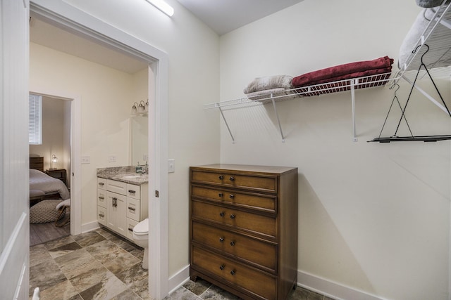 walk in closet with sink