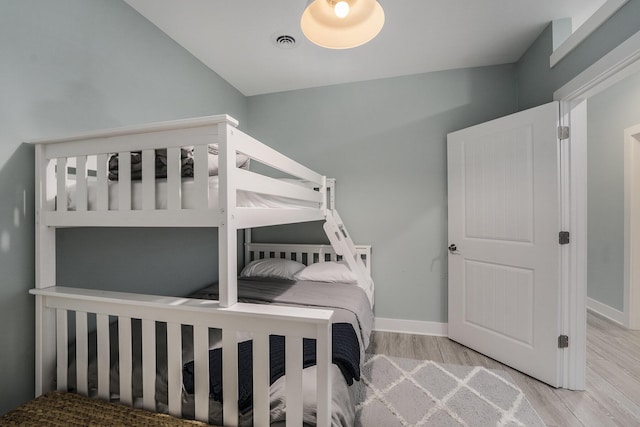 bedroom featuring light wood-type flooring