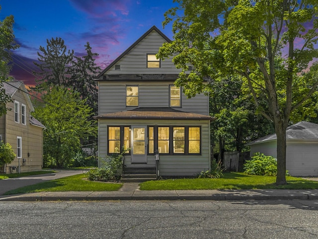 view of front of house with an outbuilding and a garage