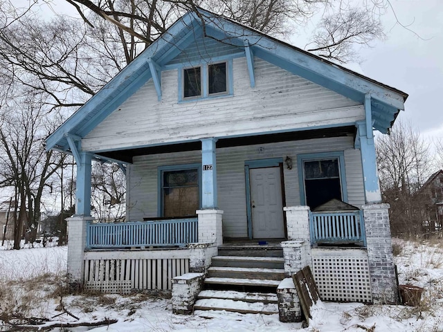 bungalow-style home featuring a porch