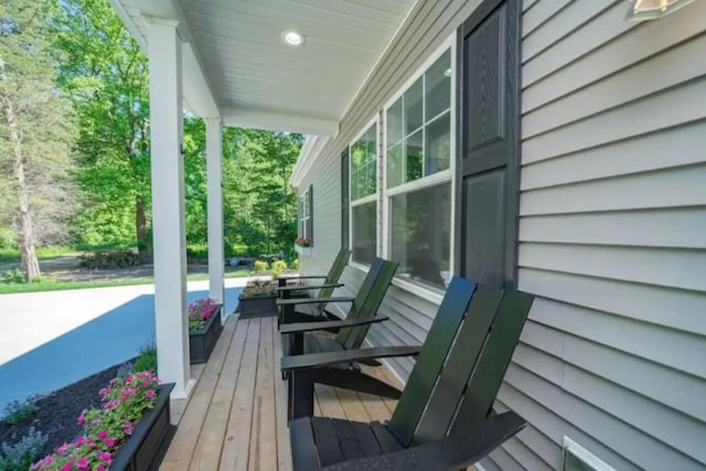 wooden terrace with covered porch