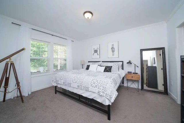 carpeted bedroom featuring ornamental molding