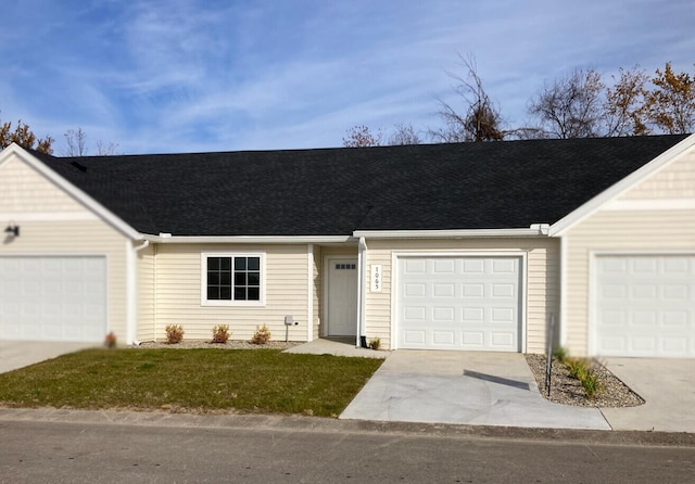 ranch-style home featuring a garage