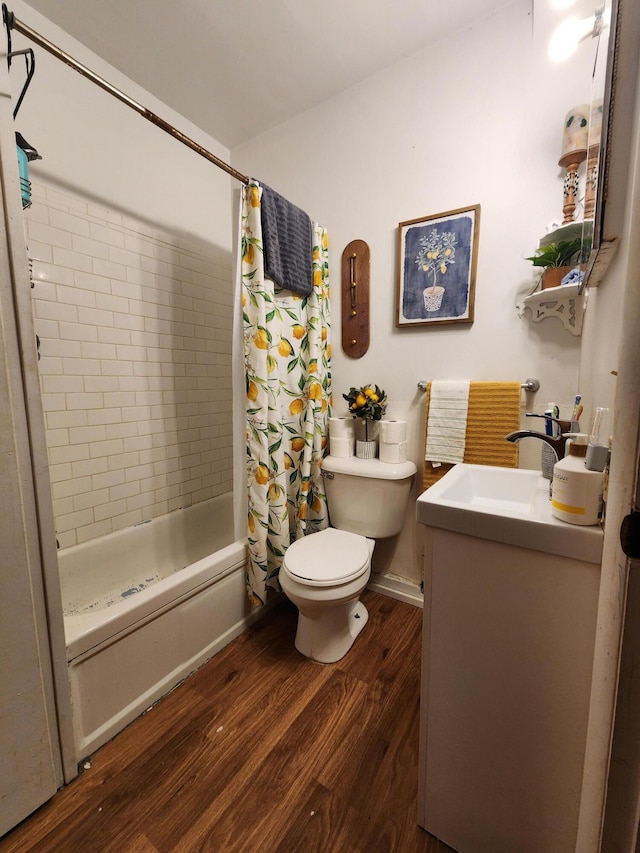 full bathroom featuring shower / tub combo with curtain, vanity, hardwood / wood-style flooring, and toilet