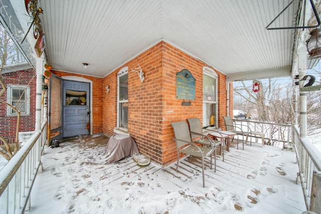 view of snow covered deck