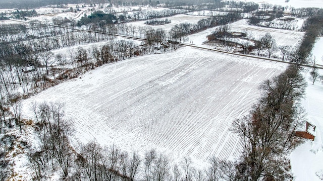 snowy aerial view with a rural view