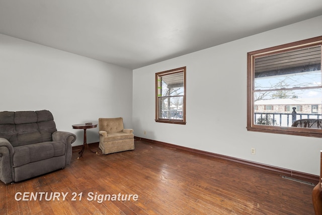 living area with dark wood-type flooring