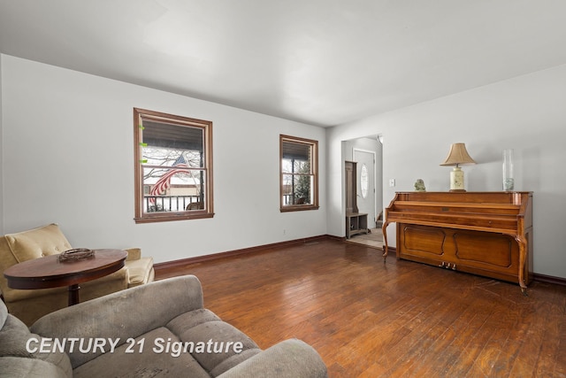 living room with dark hardwood / wood-style floors