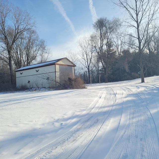 view of yard layered in snow