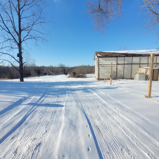 view of yard covered in snow