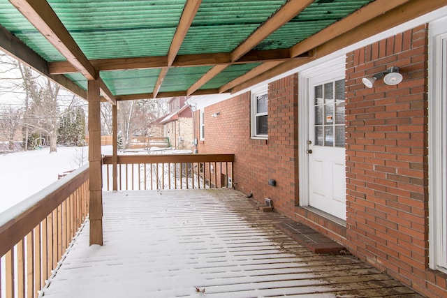 view of snow covered deck