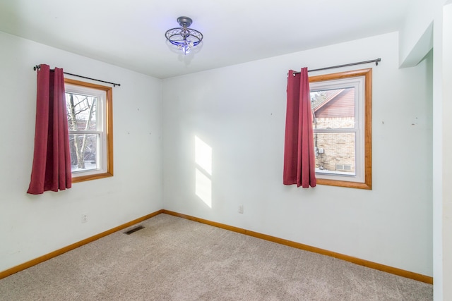 view of carpeted spare room