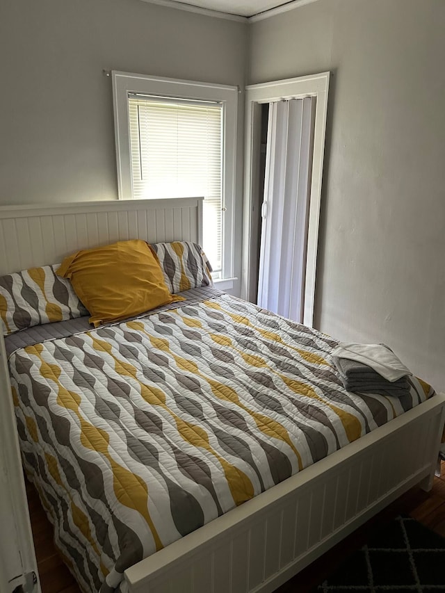 bedroom with ornamental molding