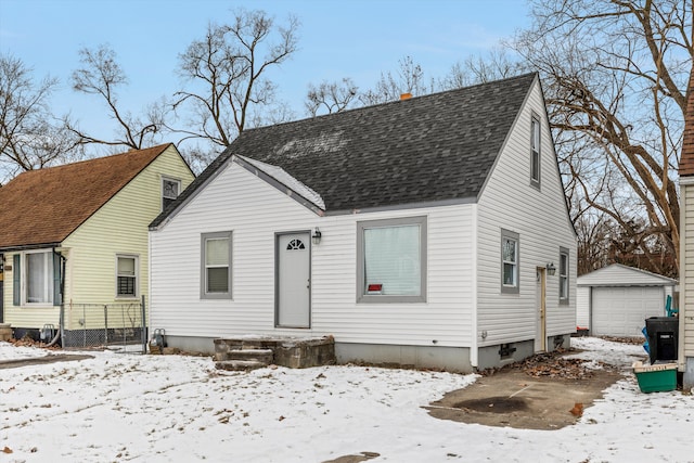 view of front of home with an outbuilding and a garage