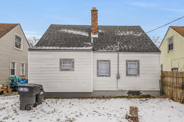 view of snow covered house