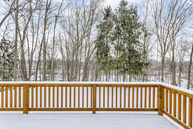 view of snow covered deck