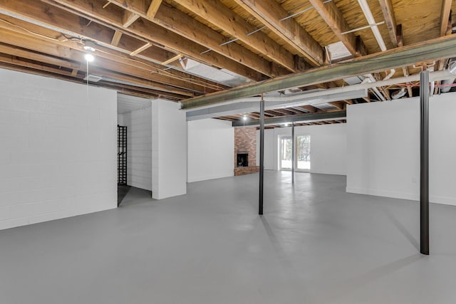 basement with a fireplace