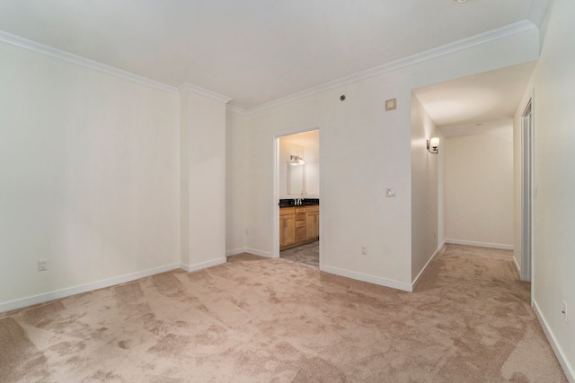 carpeted empty room with crown molding