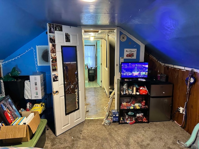 game room featuring lofted ceiling and carpet floors