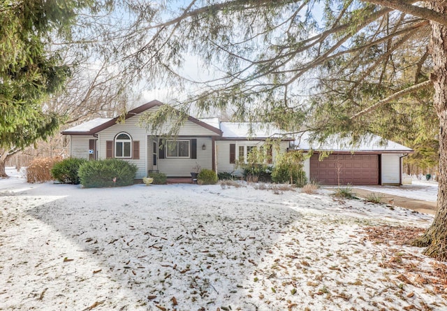 single story home with a garage