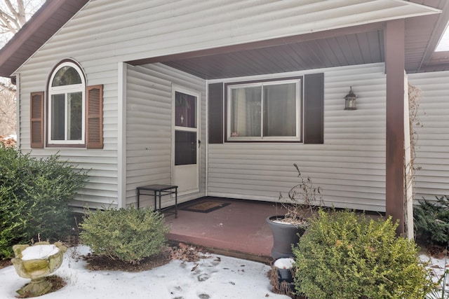 doorway to property featuring a patio area