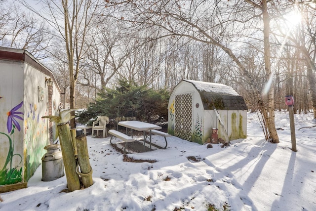 view of yard covered in snow