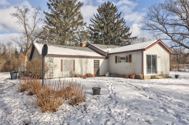 view of snow covered property