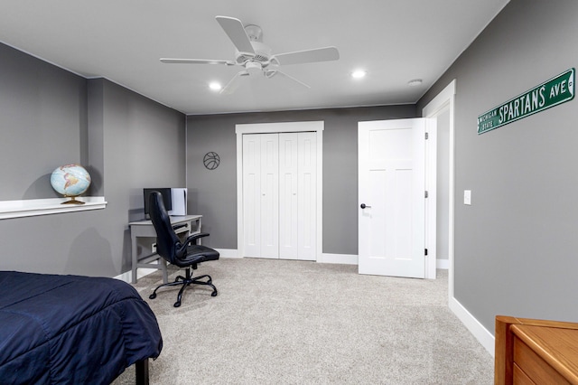 bedroom featuring carpet flooring, ceiling fan, and a closet