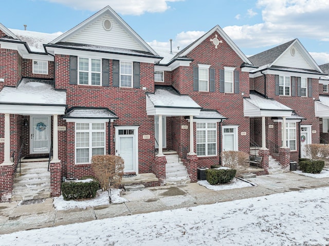 view of front facade featuring brick siding