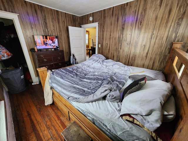 bedroom featuring dark hardwood / wood-style flooring