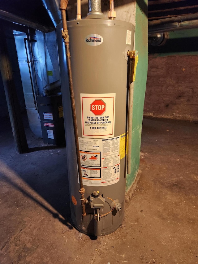 utility room with water heater