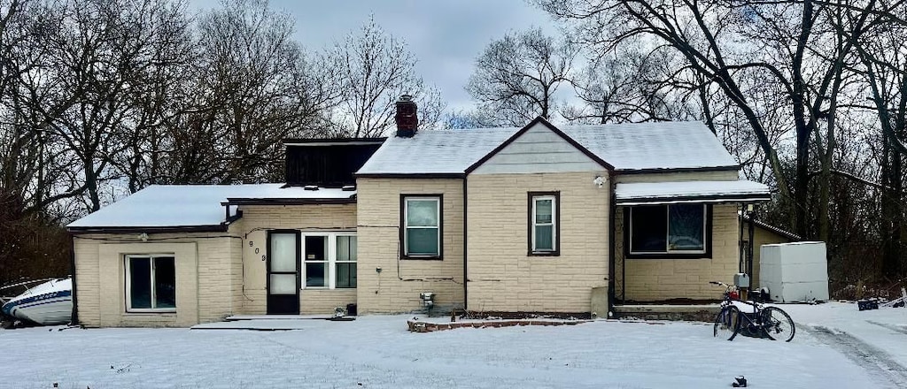 view of snow covered house