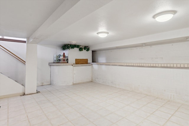 basement with a textured ceiling