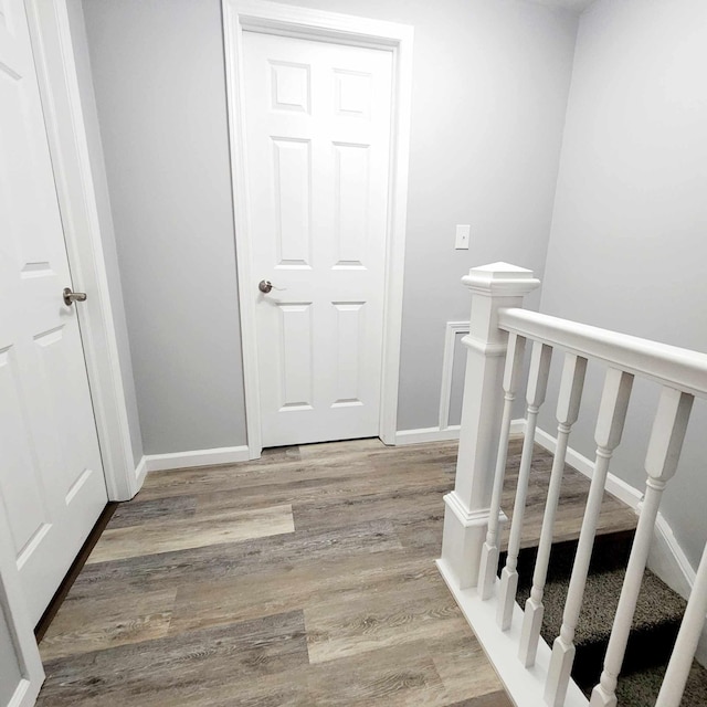 hall with light hardwood / wood-style flooring