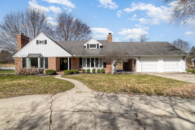 new england style home with a front lawn, concrete driveway, an attached garage, board and batten siding, and brick siding