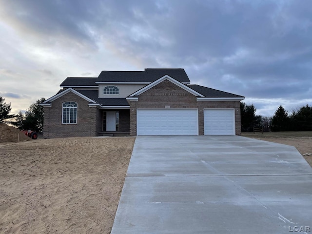 view of front of property featuring a garage