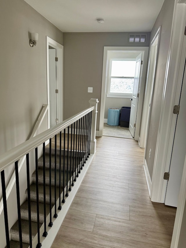 hallway featuring light hardwood / wood-style floors