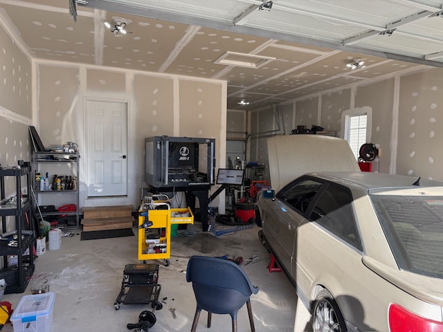 garage featuring washer / dryer