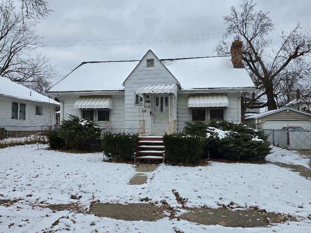 bungalow featuring a garage