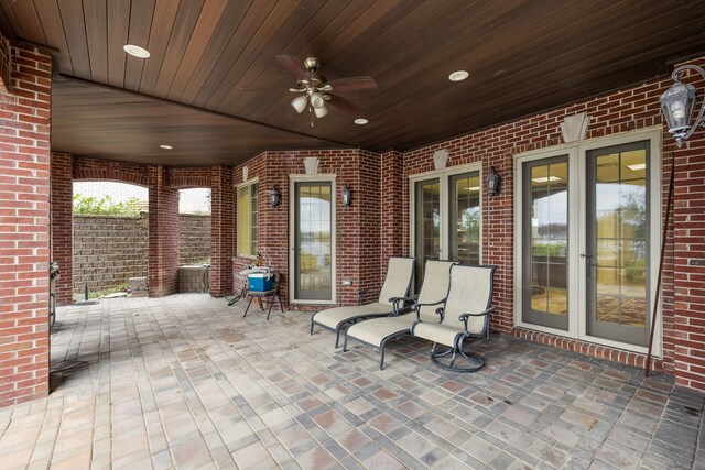 view of patio / terrace featuring french doors and ceiling fan