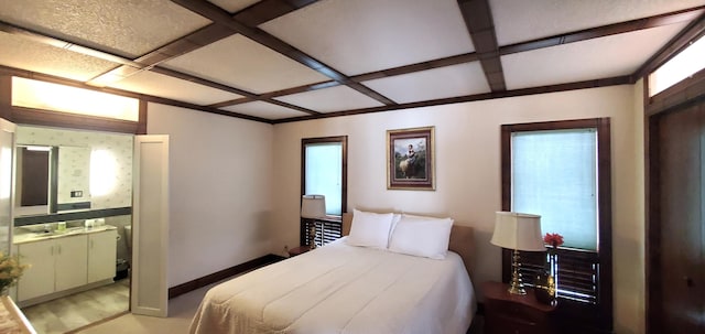 bedroom featuring coffered ceiling, beam ceiling, and multiple windows