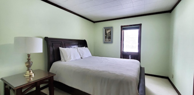 carpeted bedroom with ornamental molding