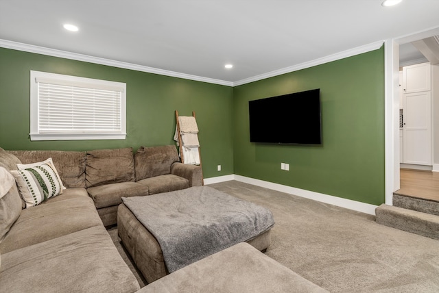 carpeted living room with ornamental molding