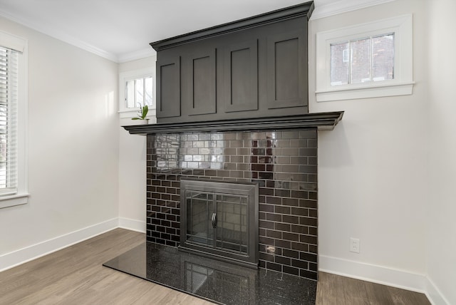 interior details featuring crown molding and wood-type flooring