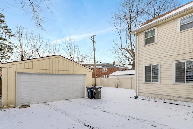 view of snow covered garage