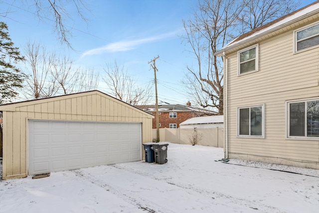 view of snow covered garage