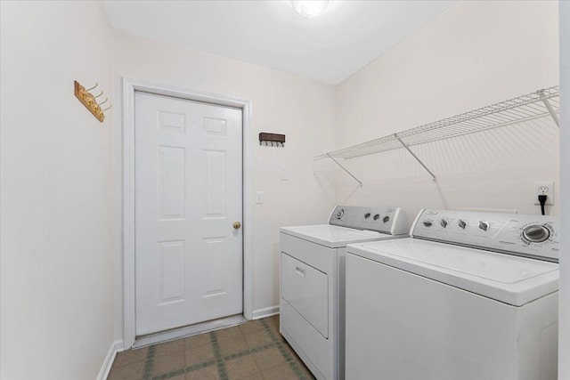 laundry room featuring washer and clothes dryer