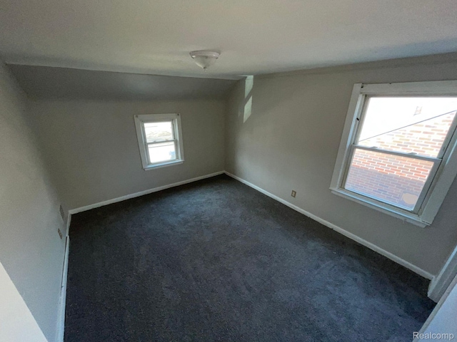 19254 Keystone St, Detroit, MI 48234 - empty room with dark carpet