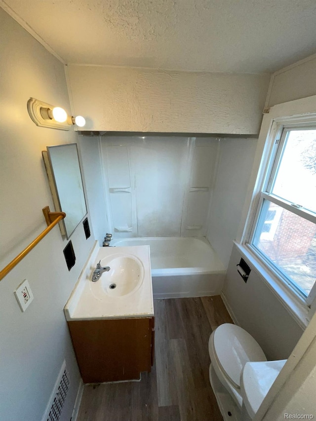 19254 Keystone St, Detroit, MI 48234 - bathroom featuring vanity, wood finished floors, and a textured ceiling